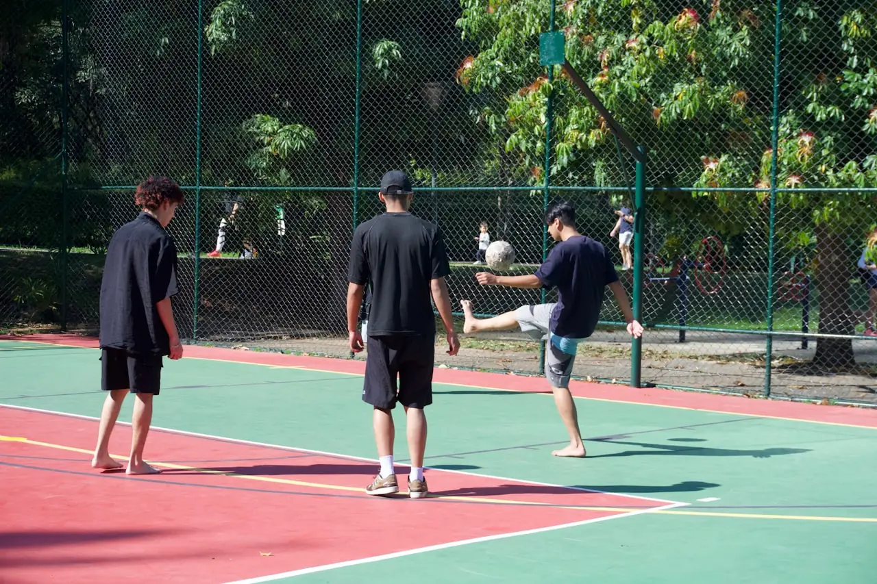 Friends playing soccer