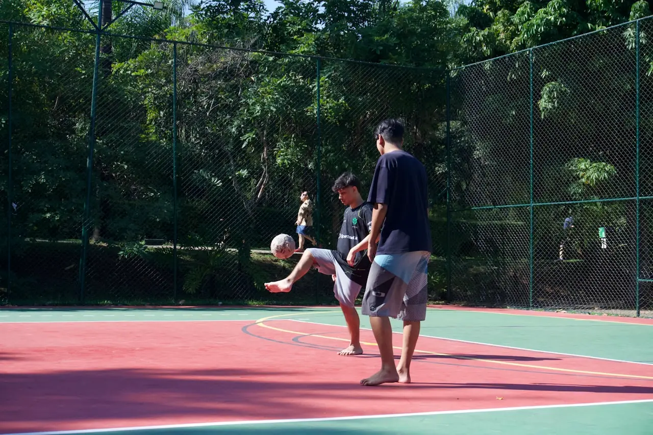 Friends playing soccer